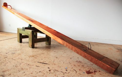 A seesaw made from reclaimed wood