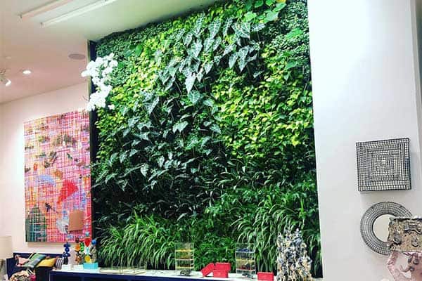 a plant wall installed in the Master Bedroom of an NYC home